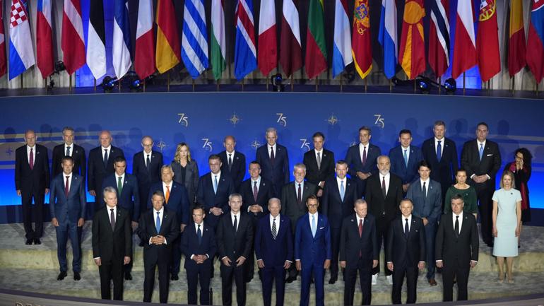 NATO leaders pose for a family photo before President Joe Biden, front row centre, delivers remarks on the 75th anniversary of NATO.