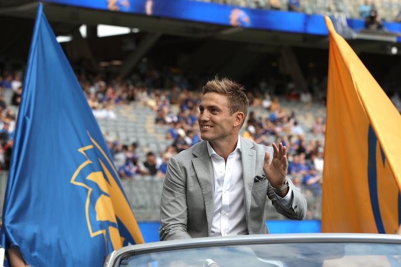 PERTH, AUSTRALIA - APRIL 03: Brad Sheppard waves to the spectators during a lap of honour before the round three AFL match between the West Coast Eagles and the Fremantle Dockers at Optus Stadium on April 03, 2022 in Perth, Australia. (Photo by Paul Kane/Getty Images via AFL Photos)