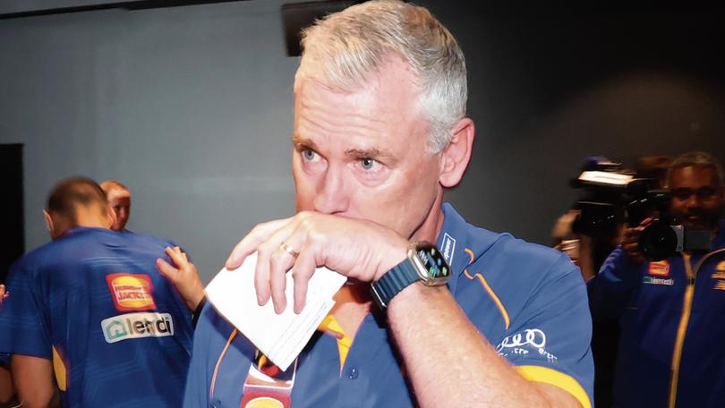 Adam Simpson steps down as coach of the West Coast.