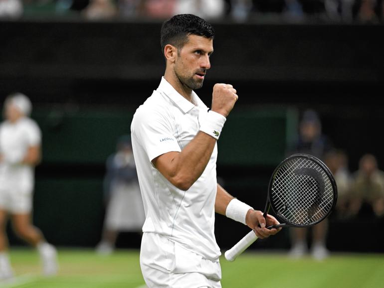 LONDON, ENGLAND - JULY 08: Novak Djokovic of Serbia celebrates winning match point with against Holger Rune of Denmark in his Gentlemen's Singles fourth round match during day eight of The Championships Wimbledon 2024 at All England Lawn Tennis and Croquet Club on July 08, 2024 in London, England. (Photo by Mike Hewitt/Getty Images)