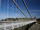 British police have launched a manhunt after two suitcases containing human remains were discovered on Clifton Suspension Bridge