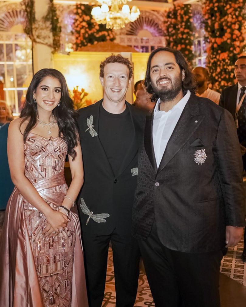 Mark Zuckerberg, centre, poses for a photograph with billionaire industrialist Mukesh Ambani's son Anant Ambani, right, and Radhika Merchant at their pre-wedding bash.