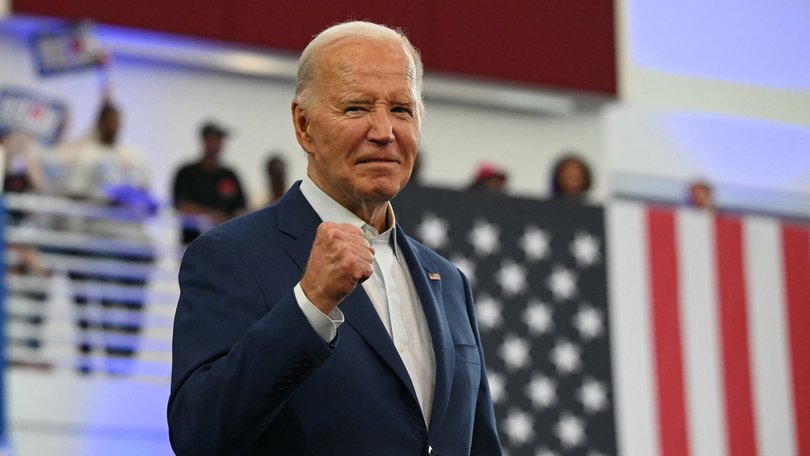 A fired up President Joe Biden arrives to speak during a campaign event at Renaissance High School in Detroit.