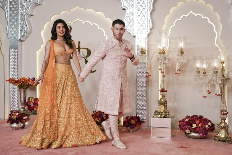 American actor and musician Nick Jonas arrives with his wife Priyanka Chopra at the wedding of Billionaire Mukesh Ambani's son Anant Ambani and Radhika Merchant at Jio World Convention Centre in Mumbai, India, on Friday.