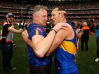 Adam Simpson and former captain Shannon Hurn embrace after the 2018 Toyota AFL Grand Final match between the West Coast Eagles and the Collingwood Magpies at the Melbourne Cricket Ground on September 29, 2018.