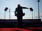 Former president Donald Trump speaks during a campaign rally in Butler, Pa., on Saturday. Trump ducked and was taken offstage after gunshots were heard during his speech.