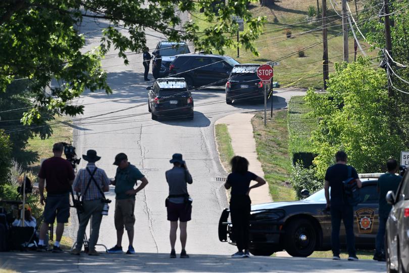 Police block a street near the Bethel Park, Pa., home of Thomas Matthew Crooks, the person suspected in the shooting at former president Donald Trump's rally in Butler.