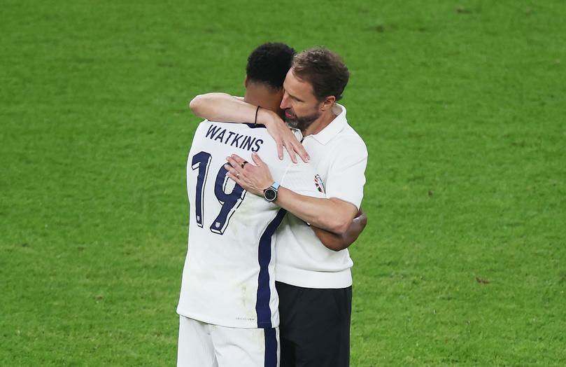 BERLIN, GERMANY - JULY 14: Gareth Southgate, Head Coach of England, interacts with Ollie Watkins of England after defeat to Spain in the UEFA EURO 2024 final match between Spain and England at Olympiastadion on July 14, 2024 in Berlin, Germany. (Photo by Alex Grimm/Getty Images)