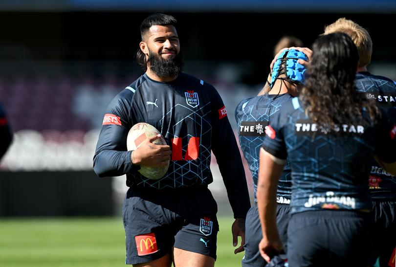 BRISBANE, AUSTRALIA - JULY 15: Payne Haas gives a smile during a New South Wales State of Origin team training session at Ballymore Stadium on July 15, 2024 in Brisbane, Australia. (Photo by Bradley Kanaris/Getty Images)