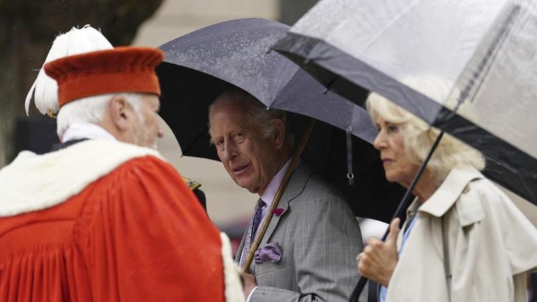 The King and Queen have been pulled away by aides after concerns during a visit to the Jersey Expo. (AP PHOTO)