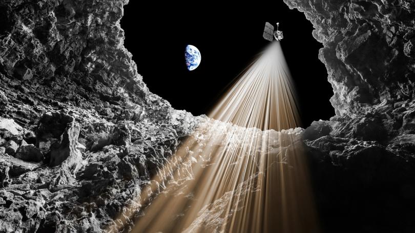 Artist's impression of the lunar pit in the Sea of Tranquillity on the Moon, an underground Moon cave that stretches tens of metres beneath an open pit and could be a potential lunar base for future astronauts.