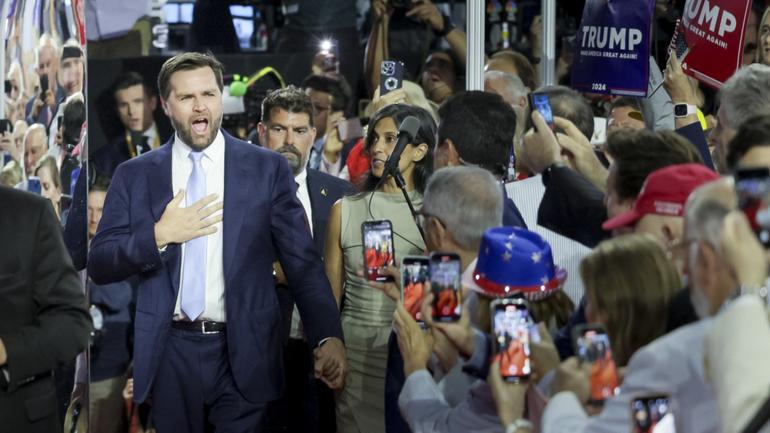 epa11480613 Republican Senator from Ohio JD Vance (L) arrives to accept his vice presidential nomination on the opening day of the Republican National Convention (RNC) in the Fiserv Forum in Milwaukee, Wisconsin, USA, 15 July 2024. The convention comes just a few days after a 20-year-old Pennsylvania man attempted to assassinate former president and current Republic presidential nominee Donald Trump. The RNC is being held 15 to 18 July 2024 and is where delegates from the Republican Party select their nominees for president and vice president in the 2024 US presidential election. EPA/ALLISON DINNER EPA-EFE/ALLISON DINNER