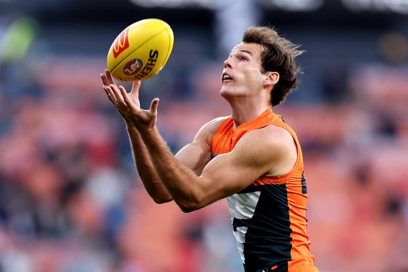 SYDNEY, AUSTRALIA - JUNE 16: Jack Buckley of the Giants grabs a mark during the round 14 AFL match between Greater Western Sydney Giants and Port Adelaide Power at ENGIE Stadium, on June 16, 2024, in Sydney, Australia. (Photo by Brendon Thorne/AFL Photos/via Getty Images)