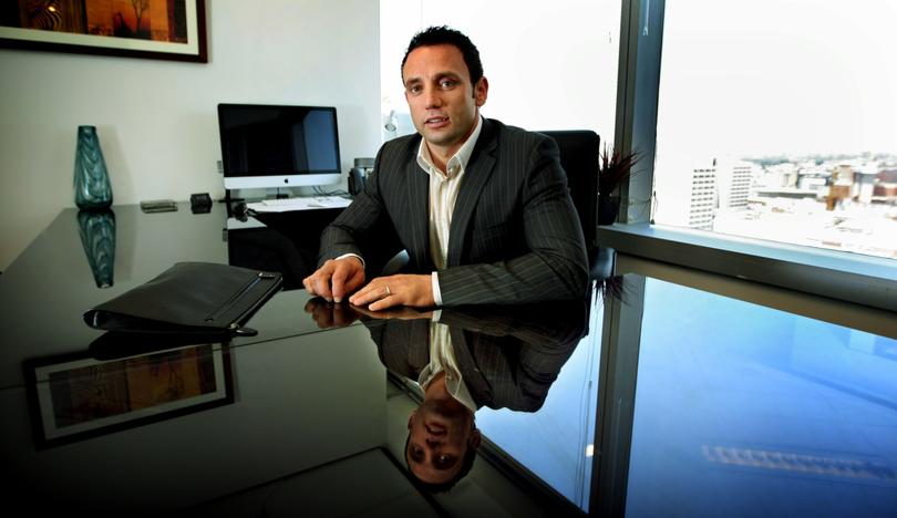 FOR AGENDA....Edmond "Monte" Margjini from the boxing ring and streets to the corporate world, pictured in his Central Park offices.
Picture: Steve Ferrier. The West Australian.
12th Feb 2010.