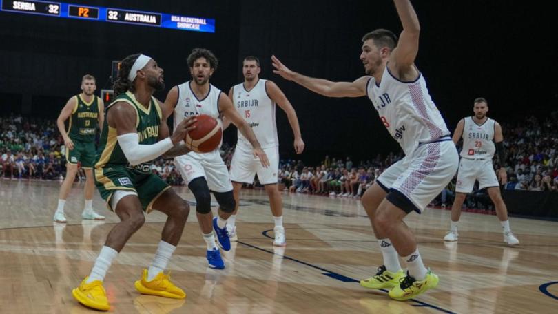 Patty Mills on the offensive during his 28-point performance against Serbia.