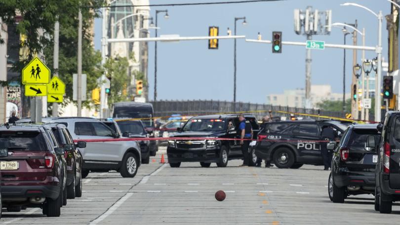 Police at the scene where one person was shot and killed by police during the second day of the 2024 Republican National Convention.