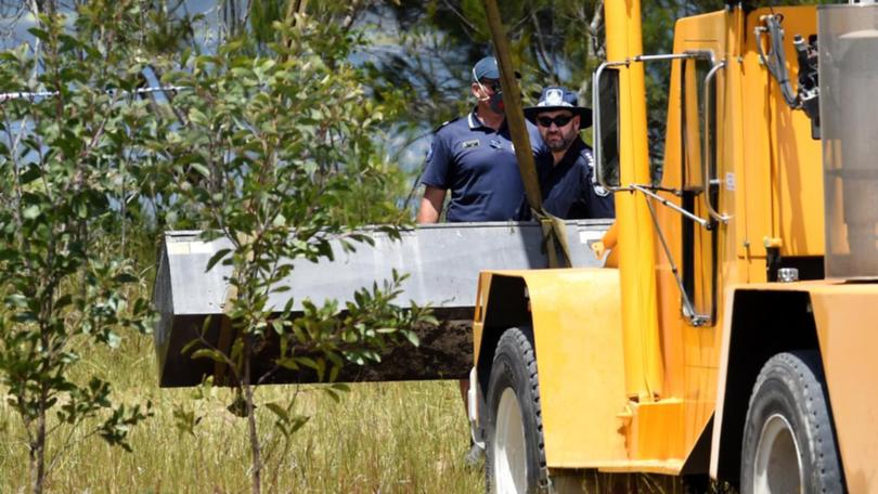 A toolbox with two drug dealers trapped inside was thrown into a lagoon south of Brisbane.