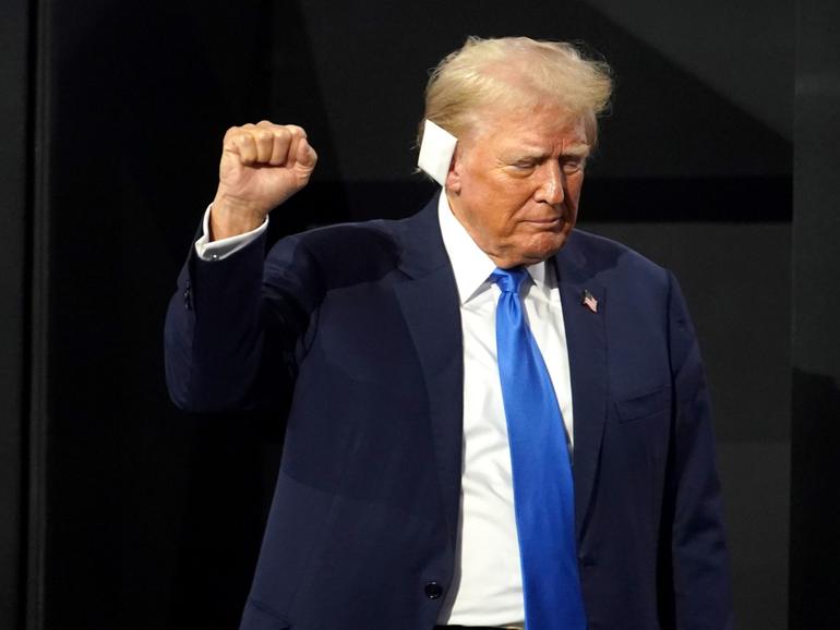 Former US President Donald Trump arrives to the Republican National Convention (RNC) at the Fiserv Forum in Milwaukee, Wisconsin, US, on Tuesday, July 16, 2024. Former President Donald Trump tapped JD Vance as his running mate, elevating to the Republican presidential ticket a venture capitalist-turned-senator whose embrace of populist politics garnered national attention and made him a rising star in the party. Photographer: Al Drago/Bloomberg