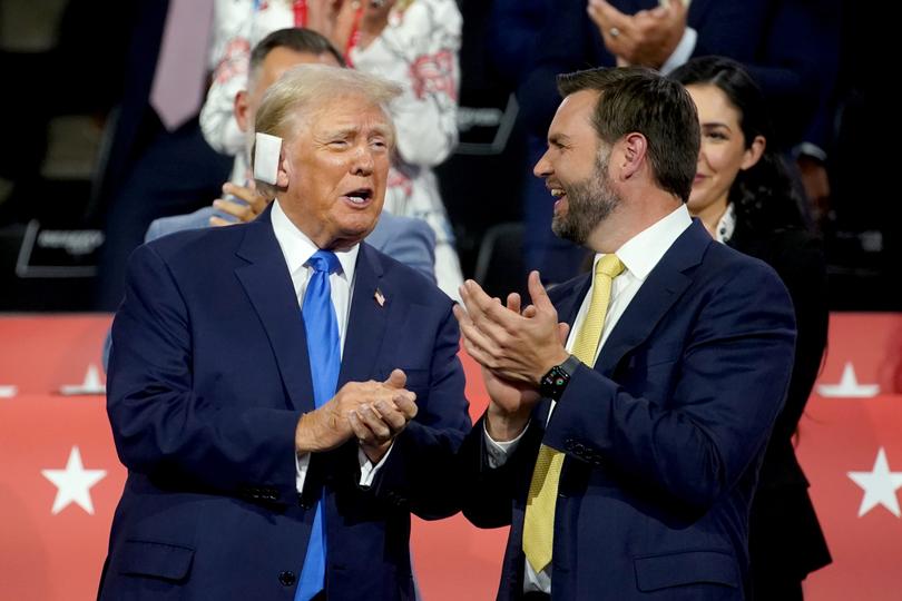 Former US President Donald Trump, left, and Senator JD Vance, a Republican from Ohio and Republican vice-presidential nominee, during the Republican National Convention (RNC) at the Fiserv Forum in Milwaukee, Wisconsin, US, on Tuesday, July 16, 2024. Former President Donald Trump tapped JD Vance as his running mate, elevating to the Republican presidential ticket a venture capitalist-turned-senator whose embrace of populist politics garnered national attention and made him a rising star in the party. Photographer: Al Drago/Bloomberg