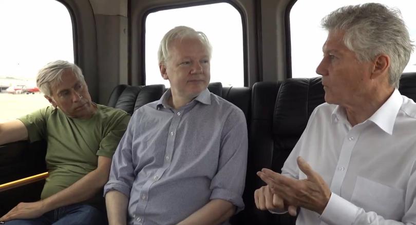 Julian Assange on a private plane approaching Bangkok airport for layover. With Stephen Smith
