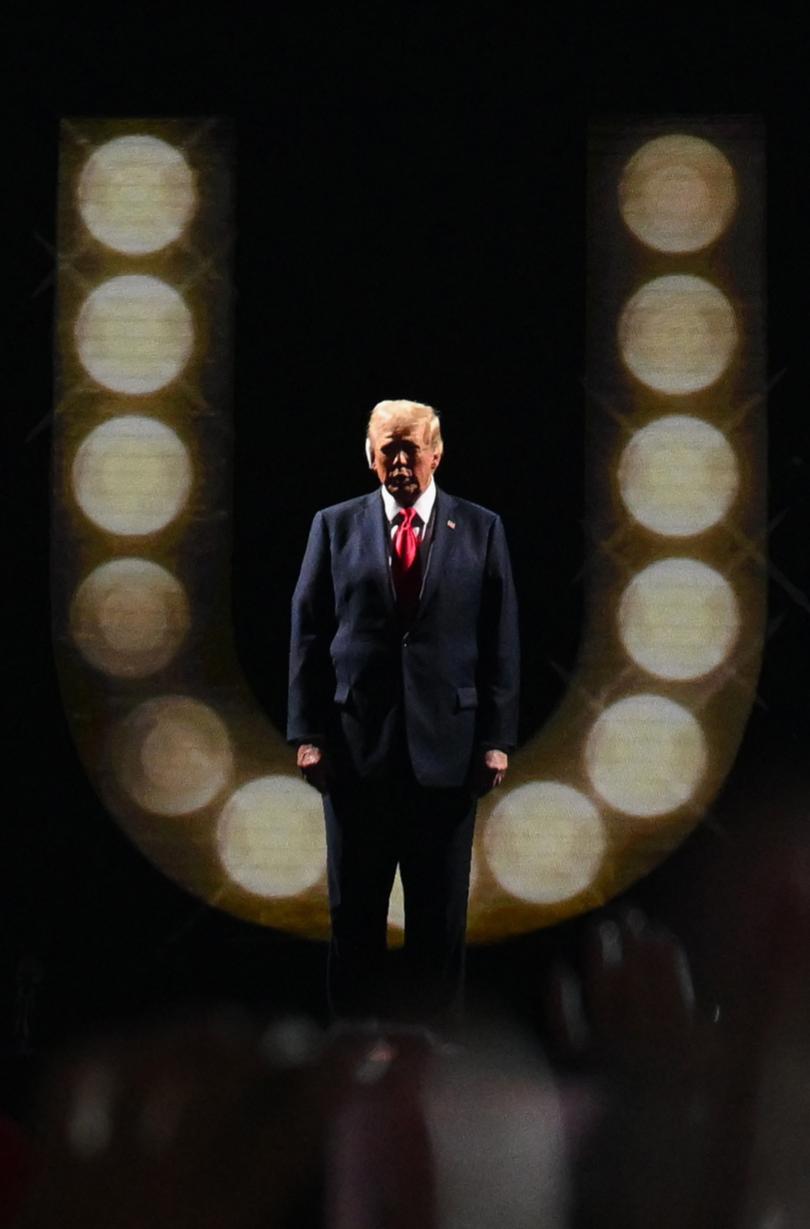 Republican presidential nominee and former U.S. President Donald Trump takes the stage on Day 4 of the Republican National Convention (RNC), at the Fiserv Forum in Milwaukee, Wisconsin, U.S., July 18, 2024. REUTERS/Callaghan O'hare