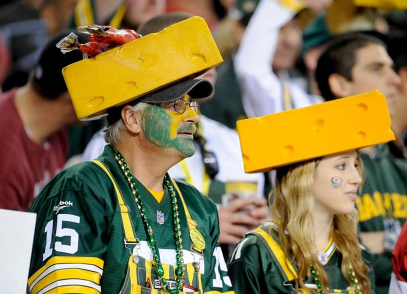 Fans of the Green Bay Packers with cheese heads look on against the Arizona Cardinals in the NFC wild-card playoff game at University of Phoenix Stadium on January 10, 2010 in Glendale, Arizona. 