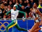 25 Sep 2000:  Cathy Freeman of Australia in action during the Women's 400m final held at Olympic Stadium during the Sydney 2000 Olympic Games, Sydney, Australia. Mandatory Credit: Stu Forster/ALLSPORT