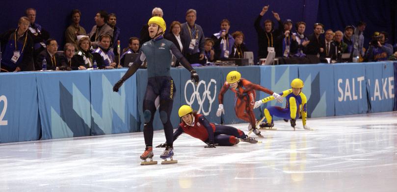 Australia's first ever Winter Gold medal winner Steven Bradbury crosses the line.