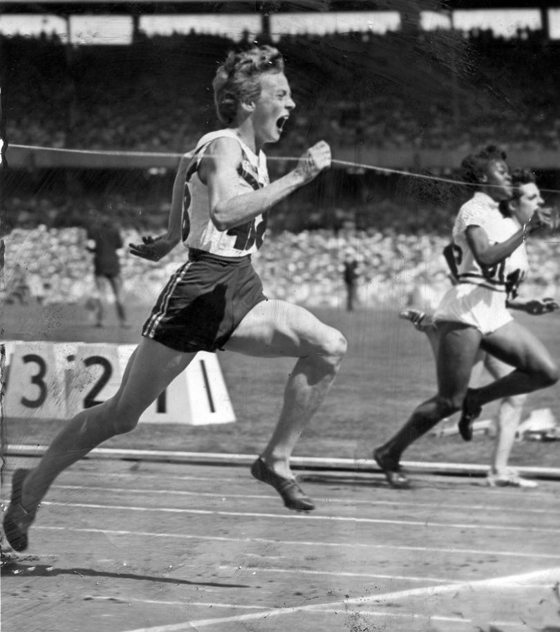 Betty Cuthbert - 1956 Melbourne Olympics - Australian runner Betty Cuthbert winning the third heat of the women's 100 meters in 11.4 secs. Second placing went to Isabelle Daniels (USA) with Anne Pashley (GBR) third. Cuthbert clipped point 1 of a second off the record.