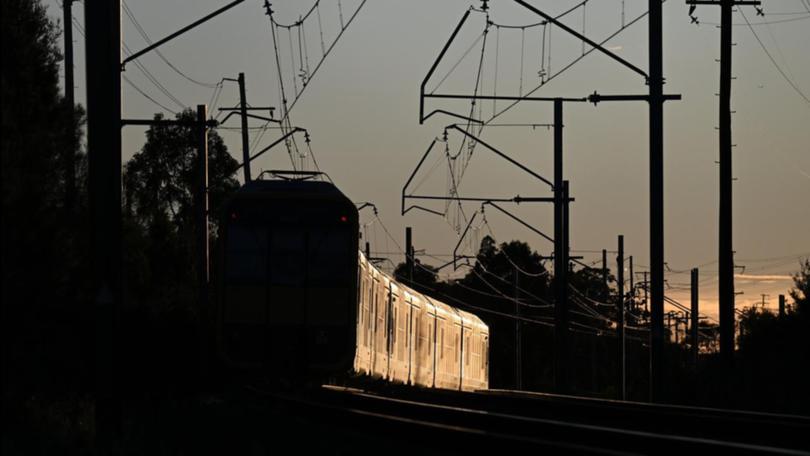 A two-year-old girl and a man have died after a pram rolled onto train tracks. (Dean Lewins/AAP PHOTOS)