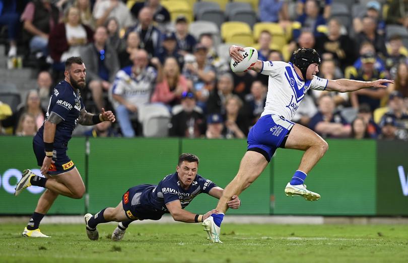 TOWNSVILLE, AUSTRALIA - JULY 21: Matt Burton of the Bulldogs makes a breakduring the round 20 NRL match between North Queensland Cowboys and Canterbury Bulldogs at Qld Country Bank Stadium, on July 21, 2024, in Townsville, Australia. (Photo by Ian Hitchcock/Getty Images)