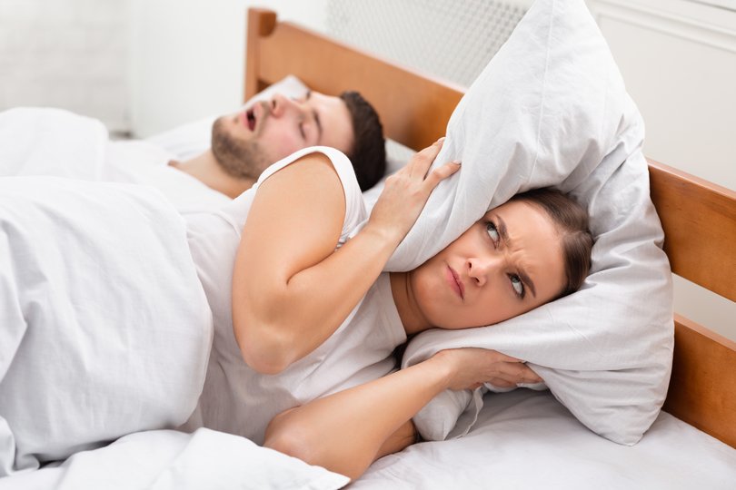Snoring is typically caused when the soft tissue in the mouth, throat or airways vibrates when air passes as people breathe during sleep.