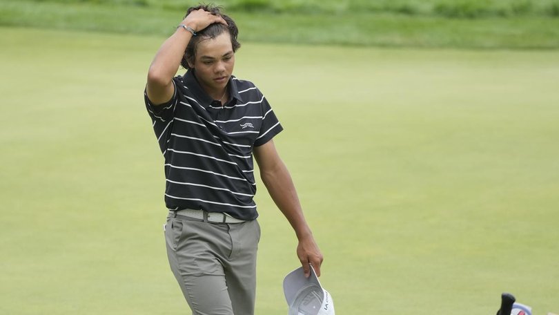 Charlie Woods walks off the 18th green after a tough first US Junior Amateur Championship.