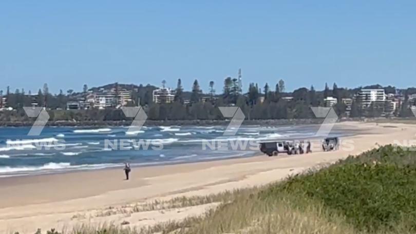A man is being treated for injuries after he was bitten by a shark at a beach in northern NSW.