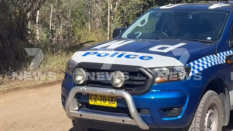 A man is being treated for injuries after he was bitten by a shark at a beach in northern NSW.