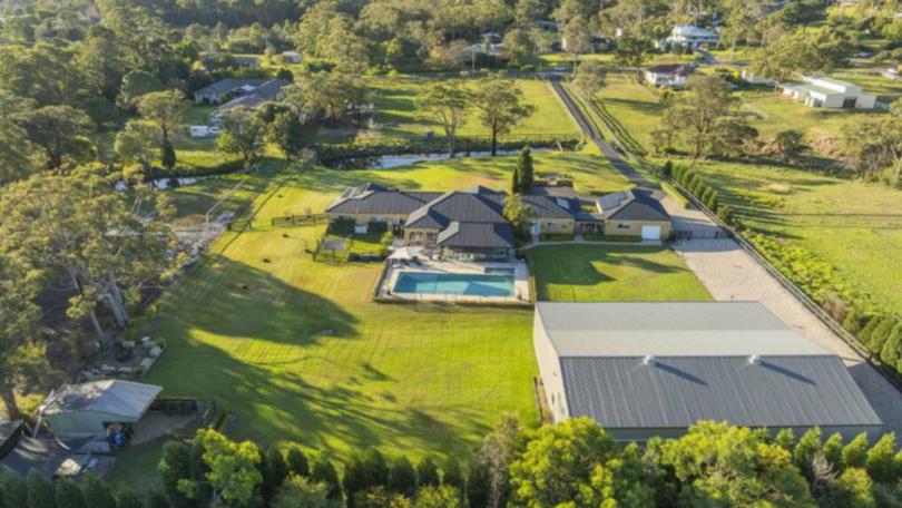 This three-acre property at 8 Casson Avenue in Eleebana is listed with Tess Fearon at Harcourts Newcastle. 