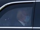 President Joe Biden wears a mask while returning to the White House from his Rehoboth Beach home after recovering from a COVID-19 infection.