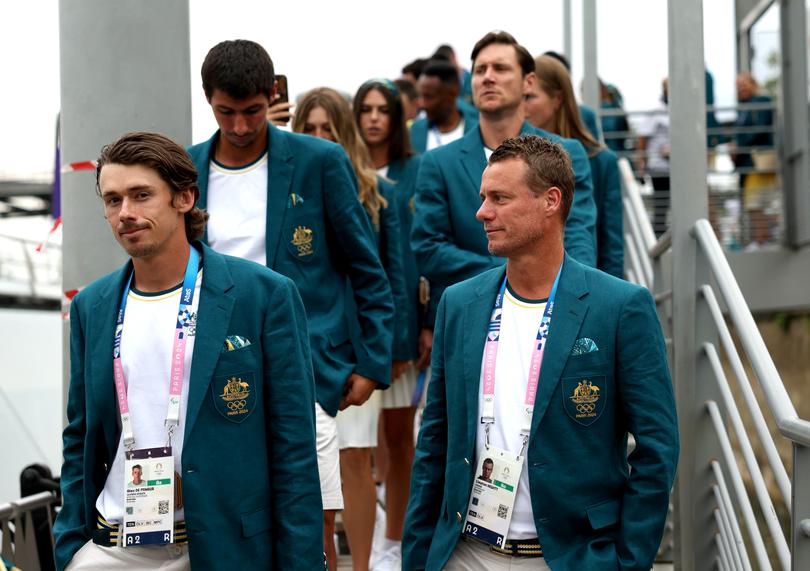 PARIS, FRANCE - JULY 26: Athletes of Team Australia Alex De Minaur and Lleyton Hewitt arrive on the team boat during the opening ceremony of the Olympic Games Paris 2024 on July 26, 2024 in Paris, France. (Photo by Quinn Rooney/Getty Images)