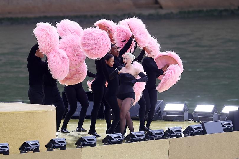 PARIS, FRANCE - JULY 26: American Singer-Songwriter Lady Gaga performs at Square Barye during the athletes’ parade on the River Seine during the opening ceremony of the Olympic Games Paris 2024 on July 26, 2024 in Paris, France. (Photo by Lars Baron/Getty Images)