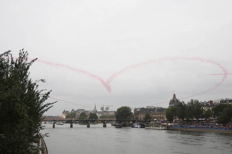 PARIS, FRANCE - JULY 26: A general view of a heart created during an aerial display over the River Seine during the opening ceremony of the Olympic Games Paris 2024 on July 26, 2024 in Paris, France. (Photo by Alex Davidson/Getty Images)