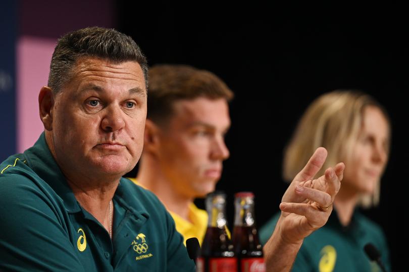 Head coach of the Australian Dolphins Olympic swimming team, Rohan Taylor (left) with swimmers Zac Stubblety-Cook (centre) and Bronte Campbell (right) speak to the media during a press conference ahead of the 2024 Paris Summer Olympic Games in Paris, France, Thursday, July 25, 2024. (AAP Image/Dean Lewins) NO ARCHIVING