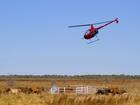 FILE IMAGE: Two pilots were killed when their helicopters crashed in WA.