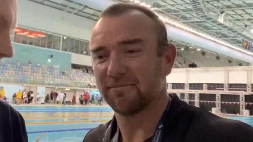 Australian swim coach Michael Palfrey won’t be sacked after his ‘Go Korea’ controversy.
