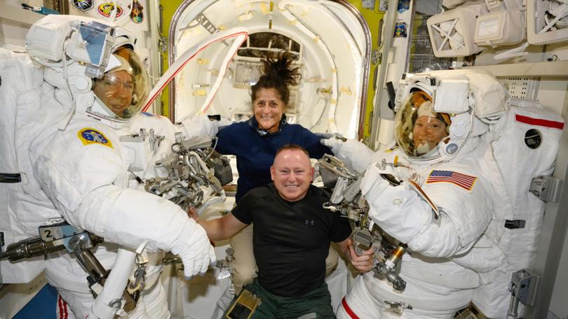 Boeing Crew Flight Test astronauts Suni Williams and Butch Wilmore, with Expedition 71 Flight Engineers Mike Barratt, left, and Tracy Dyson, aboard the International Space Station's Quest airlock.