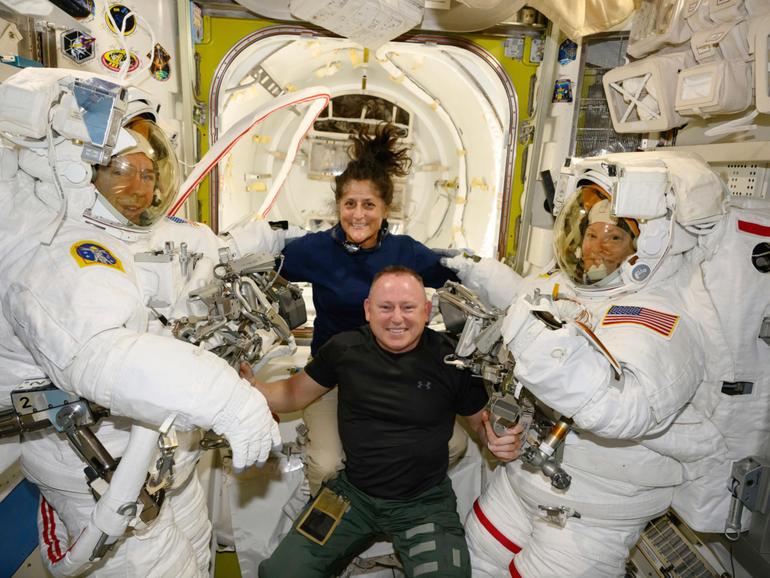 Boeing Crew Flight Test astronauts Suni Williams and Butch Wilmore, with Expedition 71 Flight Engineers Mike Barratt, left, and Tracy Dyson, aboard the International Space Station's Quest airlock.