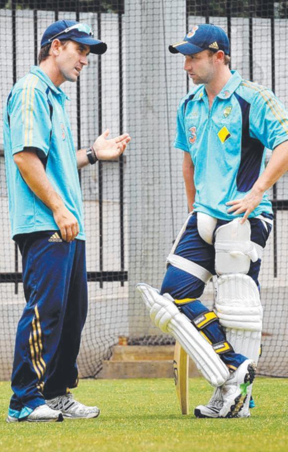 Justin Langer and Phil Hughes in the nets. Top: Hughes with The Ashes. 