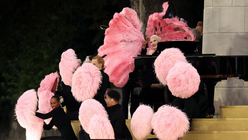 American Singer-Songwriter Lady Gaga performs at Square Barye during the athletes’ parade on the River Seine during the opening ceremony of the Olympic Games in Paris.