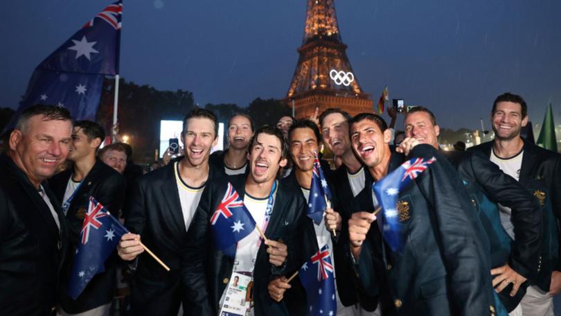 Tennis star Alex de Minaur celebrates with the Australian team.