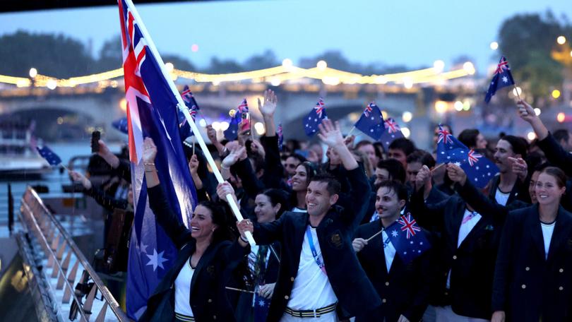 Jessica Fox and Eddie Ockenden, Flagbearers of Team Australia.