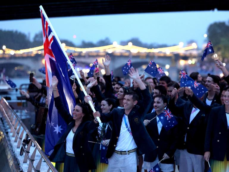 Jessica Fox and Eddie Ockenden, Flagbearers of Team Australia.